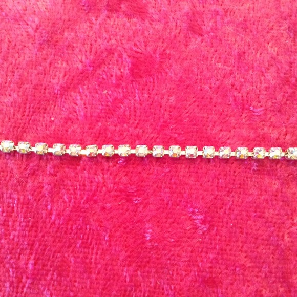 Tennis bracelet with aurora borealis.