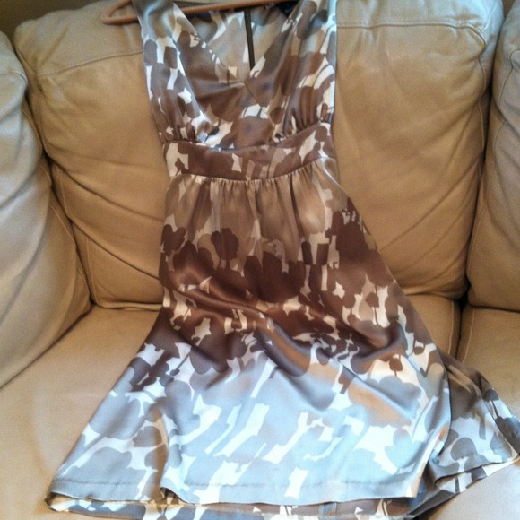 Beautiful  100% silk dress with tie in back.