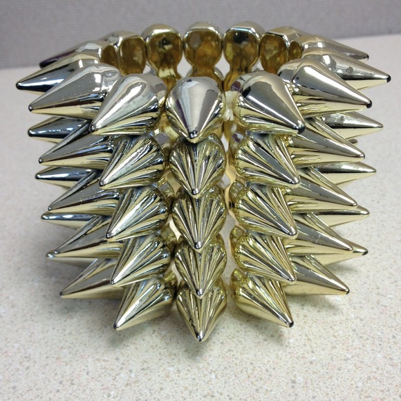****SOLD****Stretch spike bold gold bracelet.
