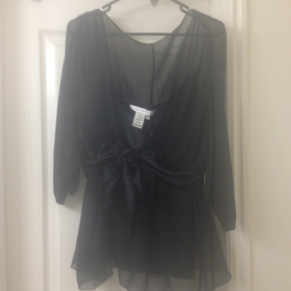 Sheer black satin tie waist blouse.