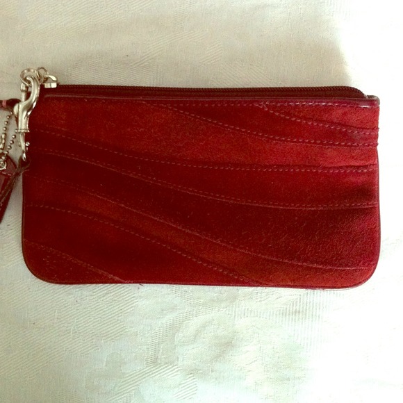 REDUCED!!  COACH suede wristlet - brick red