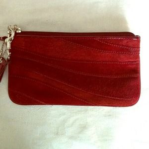REDUCED!!  COACH suede wristlet - brick red