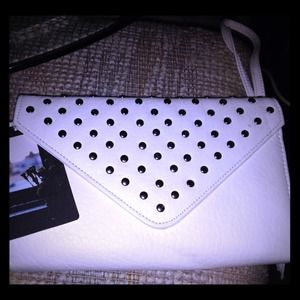 All White silver studded Clutch w/ wristlet.