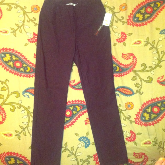 Size 4 skinny style dress pants! Never been worn!