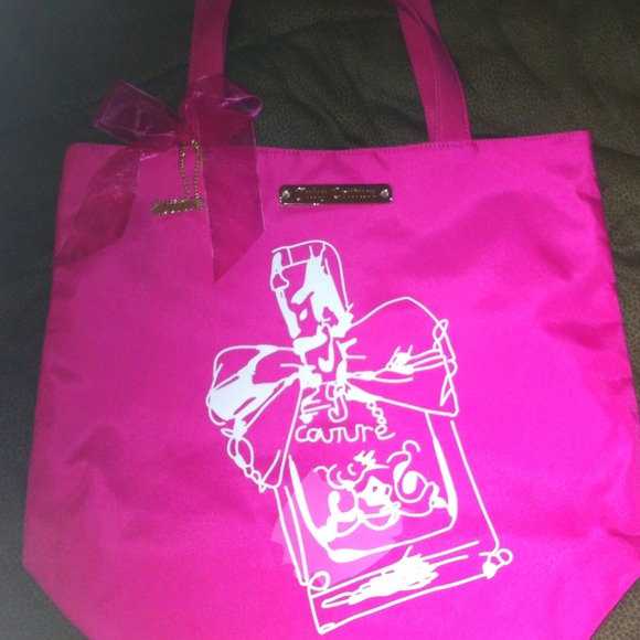 Juicy tote !! Never used ! Plastic still On it !