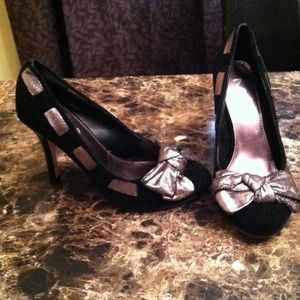 Black suede high heels with pewter bow detail