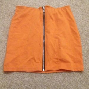 Brand new with tags H&M orange mini skirt.