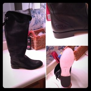 Black leather coach knee high boots