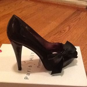 7 1/2 Patent leather peep toe with satin bow.