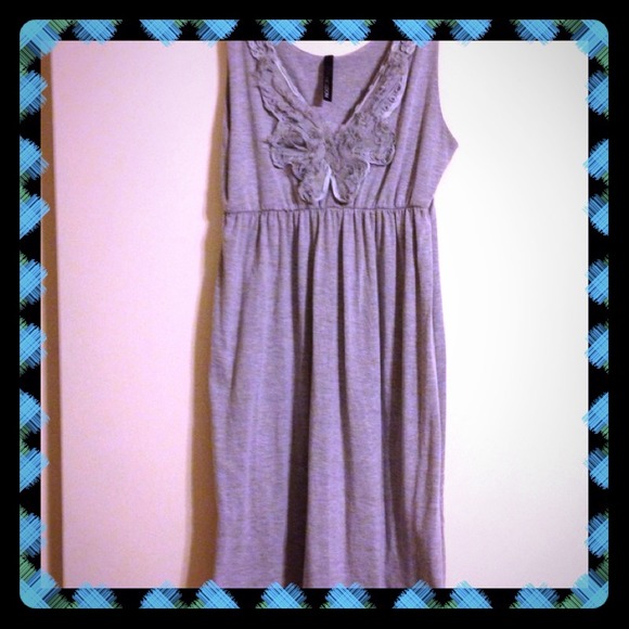 Gray dress with ruffled bow around the neck