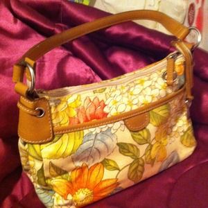 Floral printed Fossil purse.
