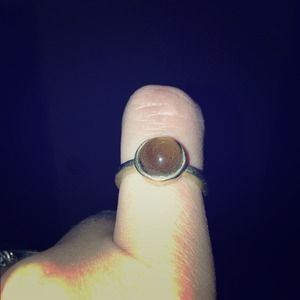 Stealing silver ring plated in gold w/ brown stone