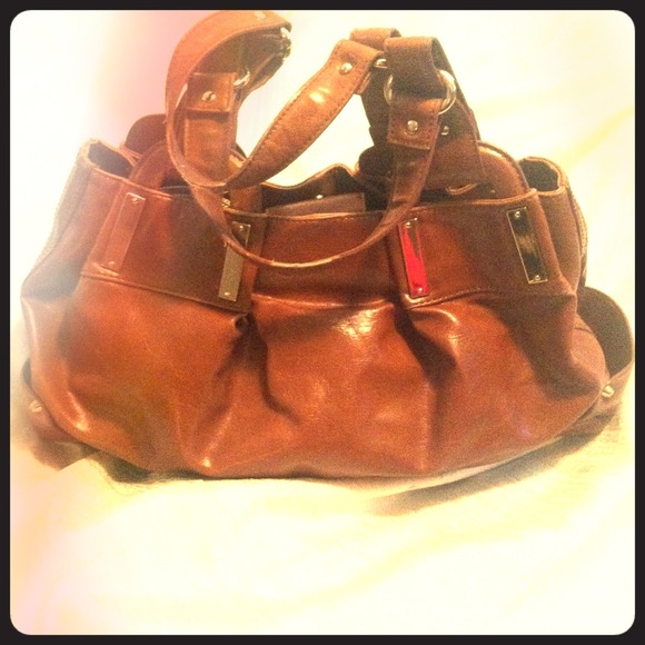 Jessica Simpson camel colored handbag.