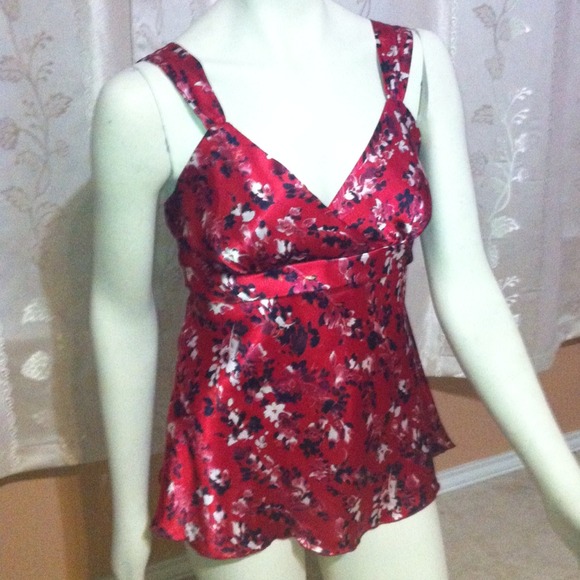 Red baby boll with black flowery design