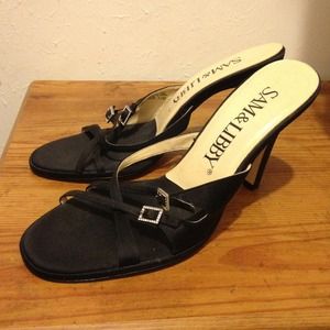 Black strapped stilettos.