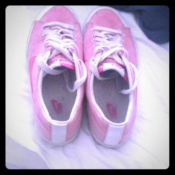 Pink converse Nike shoes.