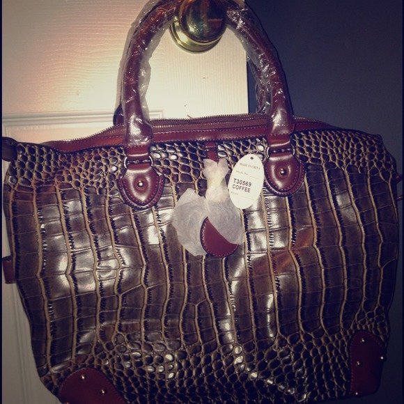 Coffee colored handbag. New with tags.