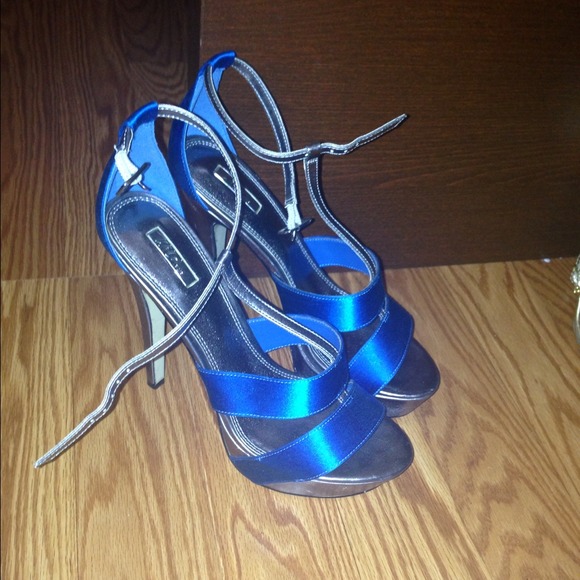 Blue and silver open toe shoes
