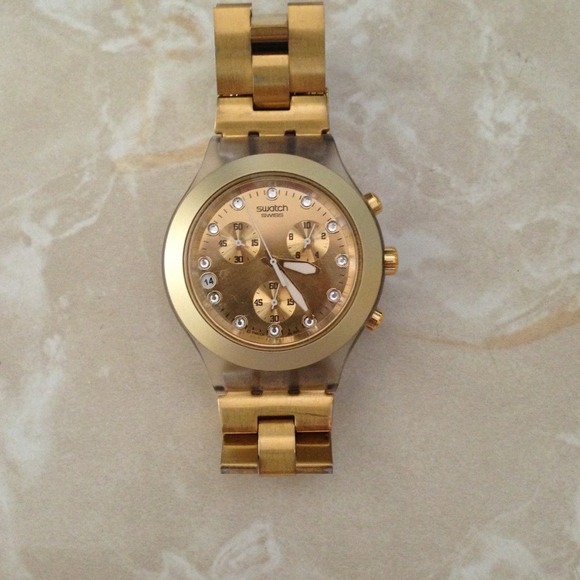Gold swatch Swiss watch
