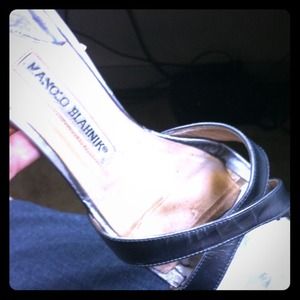 Manolo blahniks authentic silver with kitten heel.