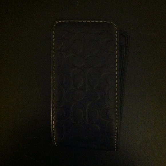 Authentic coach cell phone holder.