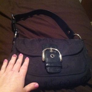 Authentic Black Horse and Carriage Coach Bag.