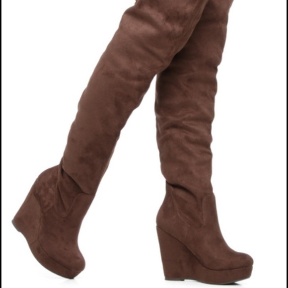Thigh high wedge boots