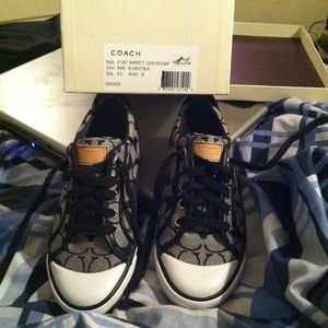 Brand new Coach sneakers in box. Worn once
