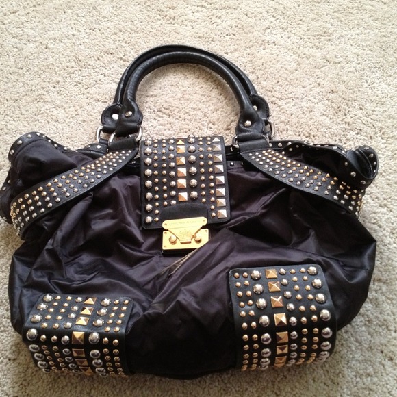Christian Audigier purse!