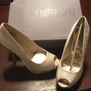 Never worn JLo Peep toe platforms. Size 6.5.