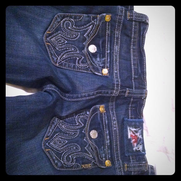 Mek jeans.  Gently worn.