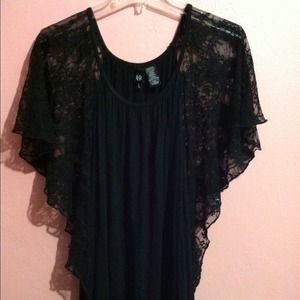 A black blouse with lace sleeves