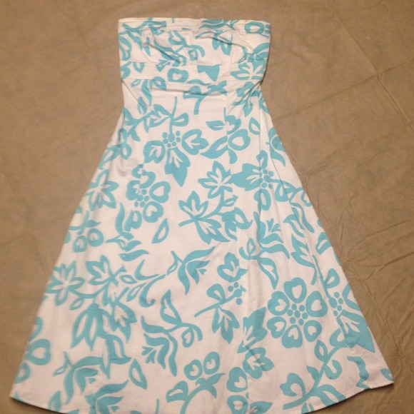 A strapless blue and white dress.