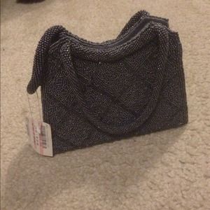 Adorable fully beaded clutch for aspecial occasion