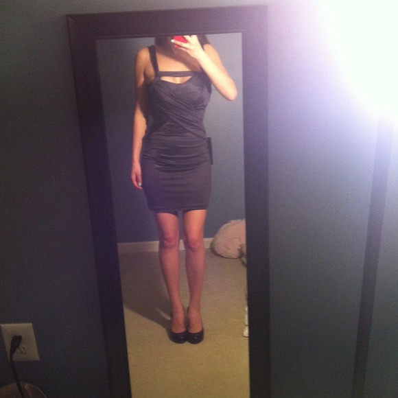 Dark navy/purple dress from bebe. Never been worn!