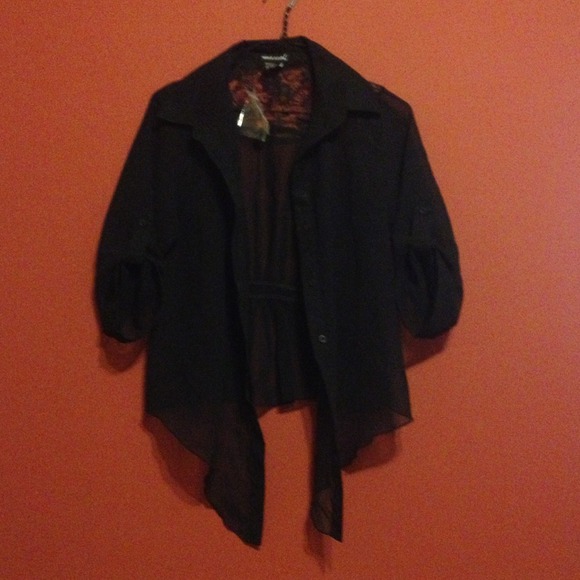 See-through black dress shirt. Cute!