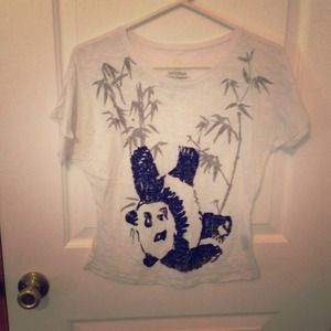 Shoulder showing panda shirt