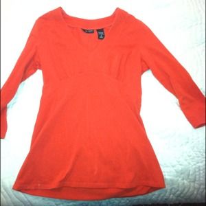 3/4 length orange shirt