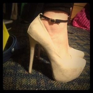 Nude color heels with switchable straps.