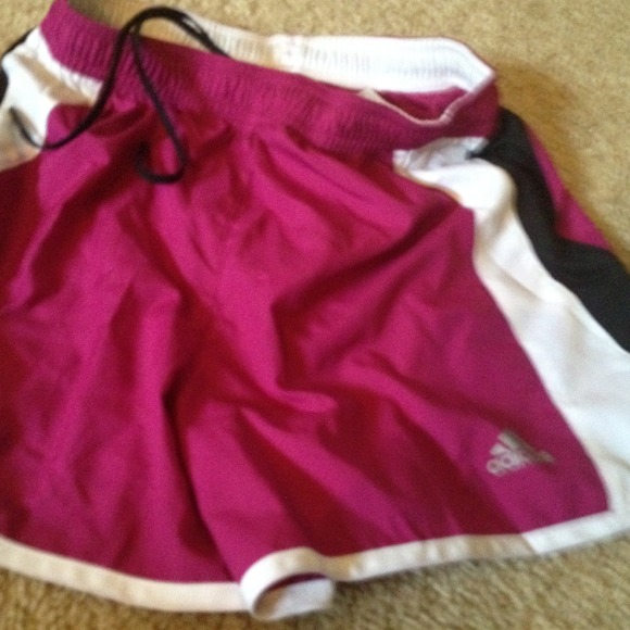 maroon and black running shorts