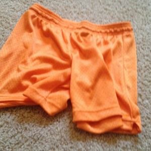 orange running shorts