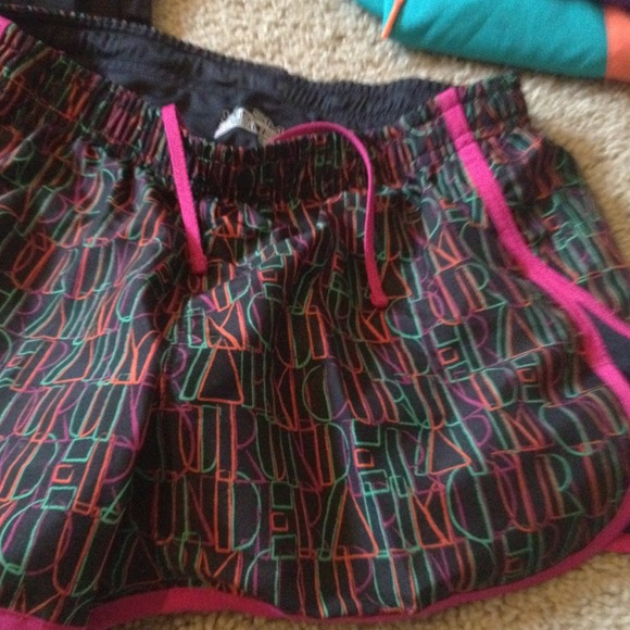 under armour maroon and green running shorts