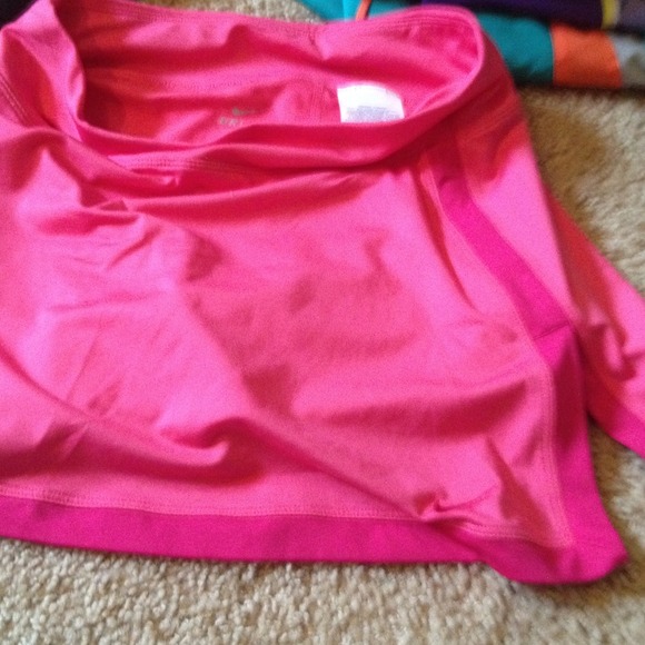 rose colored nike skirt