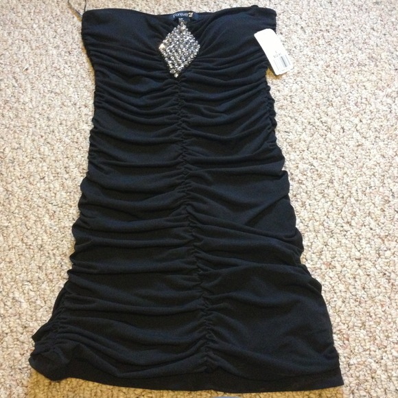 Forever 21 Dresses & Skirts - Black rouched with bead sexy dress!