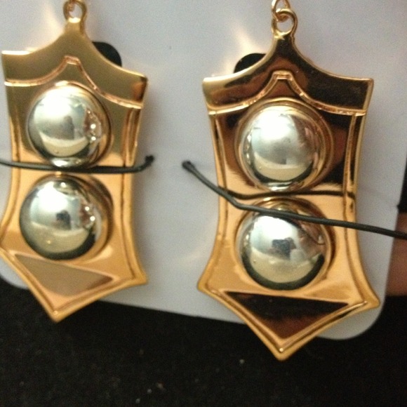 Silver/gold earring original packaging but no tags