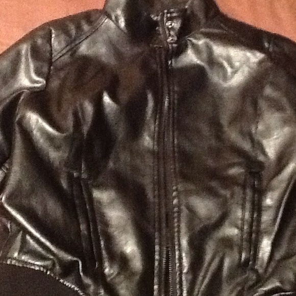 Ladies Black Polyester Leather Jacket. Very sleek!