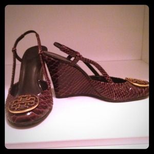 Tory Burch snake skin wedge shoes.