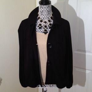 Black swing style coat.
