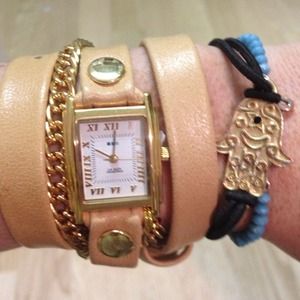 La Mer good wrap around watch with gold chain