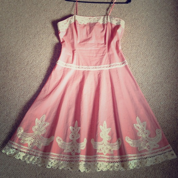 Salmon pink dress.